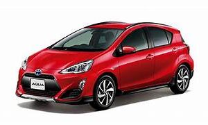 Toyota Aqua Hybrid or similar (red)